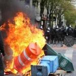 Police tried to disperse participants in a May Day rally in downtown Portland, Ore., on Monday.