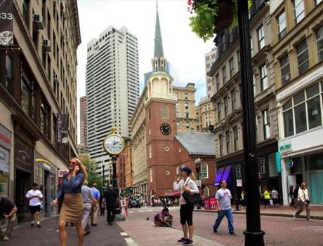 8/15/14 - Boston, MA - A view of the Old South Meeting house on Washington Street. Old and new styles of architecture abide side-by-side in Boston's Downtown Crossing. For ADDRESS feature on Downtown Crossing neighborhood of Boston, MA. Images shot on August 15, 2014. 
