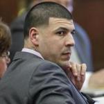 Former New England Patriots tight end Aaron Hernandez sits at the defense table Monday, March 27, 2017, during his trial in Suffolk Superior Court in Boston. Hernandez is on trial for the July 2012 killings of Daniel de Abreu and Safiro Furtado who he encountered in a Boston nightclub. The former NFL football player is already serving a life sentence in the 2013 killing of semi-professional football player Odin Lloyd. (Pat Greenhouse/The Boston Globe via AP, Pool)