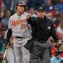 Baltimore?s Manny Machado evaded getting knee-capped on a  first-inning pitch from Red Sox starter Chris Sale that prompted a warning to both teams from home plate umpire D.J. Reyburn.