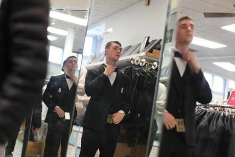Cambridge, MA., 05/04/17, Zack Siegel of Framingham, gets fitted with a tuxedo for his prom. Keezer's, the historic men's new and used clothing store is closing. The owner is Len Goldstein. Globe staff/Suzanne Kreiter
