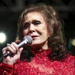 FILE - In this March 17, 2016 file photo, Loretta Lynn performs at the BBC Music Showcase at Stubb's during South By Southwest in Austin, Texas. A posting on country music legend Lynn's website says she has been hospitalized after having a stroke. The posting says Lynn was admitted into a Nashville hospital on Thursday night, May 4, 2017, after suffering the stroke at her home in Hurricane Mills, Tenn. (Photo by Rich Fury/Invision/AP, File)