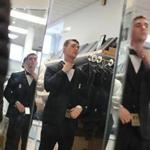 Cambridge, MA., 05/04/17, Zack Siegel of Framingham, gets fitted with a tuxedo for his prom. Keezer's, the historic men's new and used clothing store is closing. The owner is Len Goldstein. Globe staff/Suzanne Kreiter