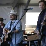 From left: Wilco members, guitarist Nels Cline, frontman Jeff Tweedy, and bassist John Stirratt, at the New Orleans Jazz and Heritage Festival in New Orleans Friday.
