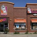 This Thursday, July 28, 2016, photo shows a Dunkin' Donuts in Edmond, Okla. Dunkin' Brands Group, Inc. reports earnings, Thursday, May 4, 2017. (AP Photo/Sue Ogrocki)