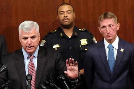 Suffolk DA Daniel F. Conley (left) says there?s no tension between his office and Boston police, led by commissioner William B. Evans (right).
