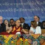 Tibetan Spiritual leader the Dalai Lama (C) and Democratic leader of the US House of Representatives Nancy Pelosi talk onstage during an event addressing exiled Tibetans gathered at the Tsuglakang Temple in McLeod Ganj on May 10, 2017. Democratic leader of the US House of Representatives Nancy Pelosi is visiting the northern Indian town of Dharamshala, home to thousands of Tibetans living in exile. / AFP PHOTO / Lobsang WangyalLOBSANG WANGYAL/AFP/Getty Images