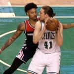 Kelly Oubre guarding Celtics center Kelly Olynyk during Game 5 of the playoffs at the TD Garden.