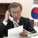 South Korean President Moon Jae-in talks on the phone with Chinese President Xi Jinping at the presidential Blue House in Seoul, South Korea, Thursday, May 11, 2017. Moon told his Chinese counterpart that he plans to send a special delegation to Beijing for talks on North Korea and a contentious U.S. missile-defense shield, Seoul officials said Thursday. ()