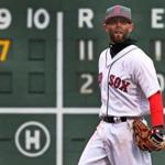 Boston, MA May 14, 2017: The scorebaord behind Red Sox 2B Dustin Pedroia tells the story,as the Rays have scored 7 runs in the top of the ninth inning to take an 11-2 lead. The Boston Red Sox hosted the Tampa Bay Rays in wan MLB regular season baseball game at Fenway Park. (Globe Staff Photo/Jim Davis) 