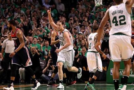 Boston, MA - 5/15/2017 - (4th quarter) Boston Celtics center Kelly Olynyk (41) was pointing the way during the fourth quarter. The Boston Celtics host the Washington Wizards in Game 7 of the Eastern Conference Semi-Finals at TD Garden. - (Barry Chin/Globe Staff), Section: Sports, Reporter: Adam Himmelsbach, Topic: 16Celtics-Wizards, LOID: 8.3.2508922496.
