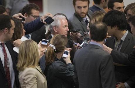 Senate Foreign Relations Committee Chairman Sen. Bob Corker, R-Tenn., is surrounded by reporters looking for a reaction on President Donald Trump's meeting with Russian officials, Tuesday, May 16, 2017, on Capitol Hill in Washington. (AP Photo/J. Scott Applewhite)
