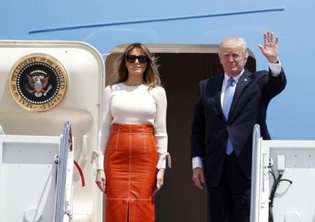 President Donald Trump, with first lady Melania Trump, waves as they board Air Force One at Andrews Air Force Base, Md., Friday, May 19, 2017, prior to his departure on his first overseas trip. (AP Photo/Alex Brandon)
