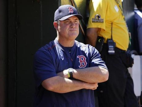 Boston Red Sox manager John Farrell watches from the dugout during a baseball game between the Oakland Athletics and the Red Sox in Oakland, Calif., Saturday, May 20, 2017. (AP Photo/Jeff Chiu)
