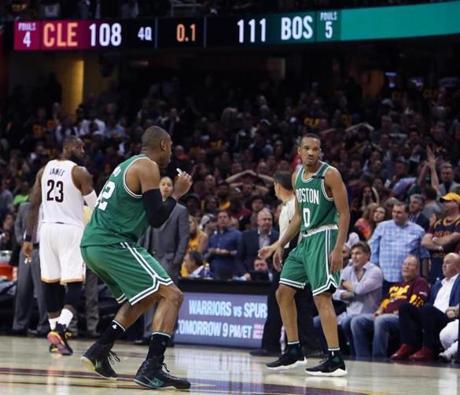 Avery Bradley (right) had the look of a stone-cold assassin after hitting his game-winning 3-pointer. Al Horford couldn?t contain his excitement.
