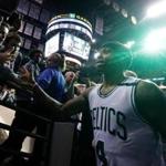 Boston, MA - 5/15/2017 - (4th quarter) Boston Celtics guard Isaiah Thomas (4) slaps hands with the fans as he leaves the court following the Celtics 115-105 win in Game 7. The Boston Celtics host the Washington Wizards in Game 7 of the Eastern Conference Semi-Finals at TD Garden. - (Barry Chin/Globe Staff), Section: Sports, Reporter: Adam Himmelsbach, Topic: 16Celtics-Wizards, LOID: 8.3.2508922496.
