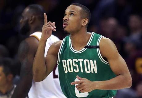 Cleveland, OH May 21, 2017: FOR USE WITH HIMMELSBACH STORY......After hitting a three pointer in the firSt quarter, Celtics guard Avery Bradley looks and points skyward, a tribute to his late mother. The Boston Celtics visited the Cleveland Cavaliers for Game Three of their NBA Eastern Conference Finals playoff series at the Quicken Loans Arena. (Globe Staff Photo/Jim Davis) 
