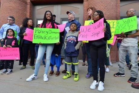Students protested against the school?s policy before its board of trustees met Sunday.
