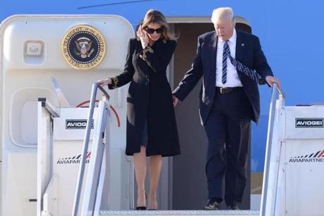 First lady Melania Trump and President Trump step off Air Force One upon arrival at Rome's Fiumicino Airport Tuesday.
