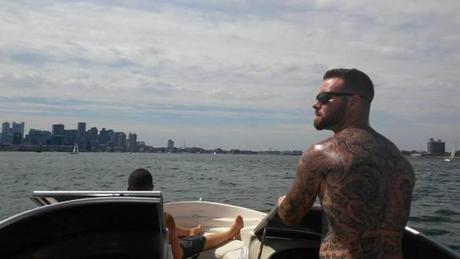 Daniel Cleggett on his boat in Boston harbor.
