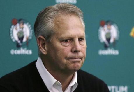 FILE - In this May 17, 2016, file photo, Boston Celtics President of Basketball Operations Danny Ainge pauses while answering a reporter's question at the basketball team's training facility in Waltham, Mass. It's been less than a decade since Danny Ainge built the Celtics back into a contender and the East?s top seed. Now with Boston locked in 2-2 tie with Washington and a trip to the conference finals on the line, the outcome will either affirm his recent moves or expose the holes that still exist as his team chases banner No. 18. (AP Photo/Charles Krupa, File)
