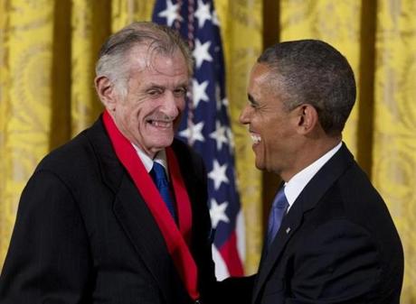FILE - In this July 10, 2013, file photo, President Barack Obama laughs with Frank Deford as he awards him the 2012 National Humanities Medal during a ceremony in the East Room of White House in Washington. Deford gave his final sports commentary on NPR?s ?Morning Edition? Wednesday, ending a run of what he calls ?little homilies? that began in 1980. (AP Photo/Carolyn Kaster, File)
