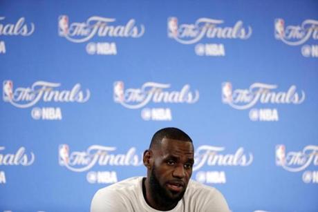 Cleveland Cavaliers' LeBron James answers questions before an NBA basketball practice, Wednesday, May 31, 2017, in Oakland, Calif. The Cavaliers face the Golden State Warriors in Game 1 of the NBA Finals on Thursday in Oakland. (AP Photo/Marcio Jose Sanchez)

