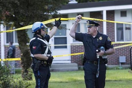 Police worked at the scene where a 81-year-old woman was found dead in Needham.
