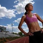 Cambridge, MA- June 01, 2017: Gabriele Grunewald poses for a portrait at Dilboy Stadium in Somerville, MA on June 01, 2017. 2014. The runner will compete in the 1,500-metre run at the track on Friday. She underwent a liver resection in August for metastatic liver cancer and will be starting chemotherapy next week. (Globe staff photo / Craig F. Walker) section: sports reporter: 
