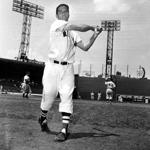 FILE - In this June 4, 1952, file photo, Jim Piersall of the Boston Red Sox poses at Fenway Park in Boston, Ma., before a game against the Cleveland Indians. Piersall, who bared his soul about his struggles with mental illness in his book ?Fear Strikes Out,? has died. The Boston Red Sox, for whom Piersall played for seven of his 17 seasons in the majors, said Piersall died Saturday, June 3, 2017, at a care facility in Wheaton, Ill., after a monthslong illness. (AP Photo/P.J. Carroll, File)