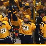 NASHVILLE, TN - JUNE 05: P.A. Parenteau #11 of the Nashville Predators celebrates a goal by teammate Calle Jarnkrok #19 (not pictured) against the Pittsburgh Penguins during the first period of Game Four of the 2017 NHL Stanley Cup Final at the Bridgestone Arena on June 5, 2017 in Nashville, Tennessee. (Photo by Frederick Breedon/Getty Images)