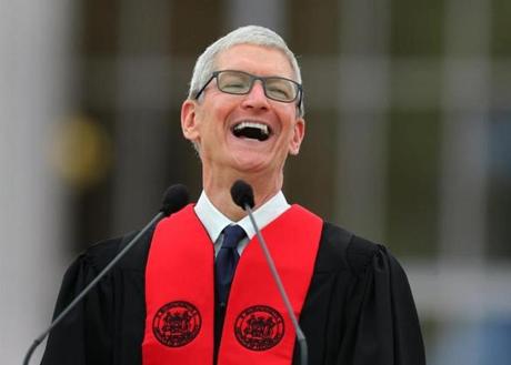 MIT president L. Rafael Reif (left) chatted with Tim Cook during the procession Friday.
