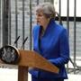 LONDON, ENGLAND - JUNE 09: Prime Minister Theresa May speaks outside 10 Downing Street after returning from Buckingham Palace on June 9, 2017 in London, England. After a snap election was called by Prime Minister Theresa May the United Kingdom went to the polls yesterday. The closely fought election has failed to return a clear overall majority winner and a hung parliament has been declared. (Photo by Dan Kitwood/Getty Images)