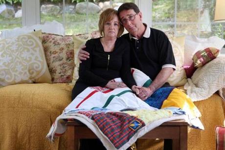Carol and Warren Chesley with a memory quilt honoring their son, Jason. They won a change in procedure after Jason?s death at Arbour Hospital in Jamaica Plain in 2002. They were incensed to hear of a similar death in Pembroke in 2015.
