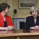 British Prime Minister Theresa May (right) met with Arlene Foster, leader of Northern Ireland?s Democratic Unionists, in July 2016 in Belfast. The DUP, which favors Northern Ireland staying in the United Kingdom, will help Conservatives remain in power.