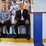 Boston, MA -- 6/13/2017 - Celtics Legend Dave Cowens (L) and Bobby Orr laugh as they sit together in the penalty box in the Bobby Orr suite at the Ames Boston Hotel. (Jessica Rinaldi/Globe Staff) Topic: orr suite Reporter: 