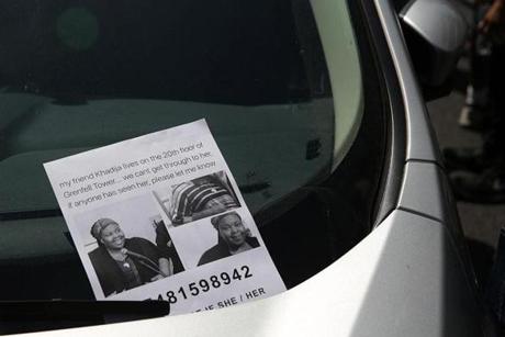 LONDON FIRE SLIDER A flyer for a missing person Khadija Saye, is seen on a car near a temporary casualty bureau opened for people affected by the fire at Grenfell Tower, a residential block of flats on June 14, 2017 in west London, as firefighters continue to control a fire. Shaken survivors of a blaze that ravaged a west London tower block told Wednesday of seeing people trapped or jump to their doom as flames raced towards the building's upper floors and smoke filled the corridors. / AFP PHOTO / DANIEL LEAL-OLIVASDANIEL LEAL-OLIVAS/AFP/Getty Images
