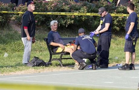 SHOOTING SLIDER epa06027760 A man receives medical attention from first responders on the scene following a shooting in Alexandria, Virginia, USA, 14 June 2017. Republican Representative Steve Scalise and two Capitol police officers were injured, according to media reports. EPA/MICHAEL REYNOLDS
