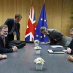 British Prime Minister Theresa May attendeds a meeting with European Council president Donald Tusk (right) during a European Union leaders summit in Brussels Thursday.