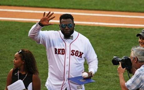 Boston, MA- June 23, 2017: David Ortiz waves to the crowd after a ceremony at Fenway Park in Boston, MA on June 23, 2017. On Friday night, the Sox retired the No. 34 that was worn by David Ortiz for 14 seasons and three World Series championships. It comes a little less than nine months after his final game.(CRAIG F. WALKER/GLOBE STAFF) section: sports reporter:
