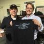 Matt Damon (left) and Don Law backstage at Gillette Stadium with a shirt commemorating the Paradise Rock Club?s 40th anniversary.
