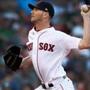 Boston, MA: June 26, 2017:Red Sox starting pitcher Chris Sale fires a first inning pitch. The Boston Red Sox hosted the Minnesota Twins in a regular season MLB baseball game at Fenway Park. (Globe Staff Photo/ Jim Davis) 