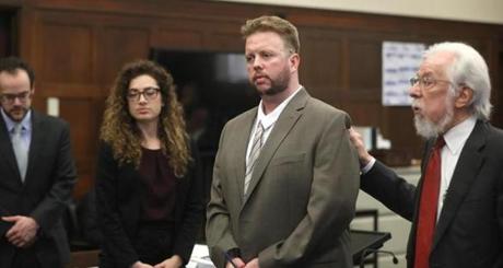 Boston, MA - 5/22/2017 - Defense attorney Jonathan Shapiro (cq), right, introduces Michael McCarthy (cq) to potential jurors. From left are BC Law student intern Michael Patnode (cq) and co-counsel Mia Teitelbaum (cq). Jury selection begins for Commonwealth vs. Michael McCarthy (cq), in Suffolk Superior Court. McCarthy is charged with the murder of 2-year-old Bella Bond (cq). Judge Janet Sanders presides. POOL Photo by Pat Greenhouse/Globe Staff Topic: 23mccarthy Reporter: Nestor Ramos
