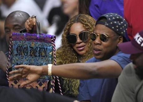 Beyonce and Jay Z watched during the first half in Game 7 of an NBA basketball first-round playoff series between the Los Angeles Clippers and the Utah Jazz in Los Angeles.
