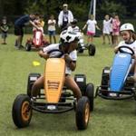 Pedal car riding at Beaver Summer Camp, held at Beaver Country Day School in Chestnut Hill.