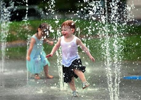 South Bosotn-07/01/2017- Nori Swoboda, 2 from South Boston cooled off at the new children's spray fountain at Medal of Honor Park in South Boston. John Tlumacki/The Boston Globe(metro)
