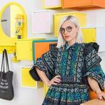 Erin Robertson?s ?Project Runway? prize bounty included $100,000 to start her business. In her colorful Boston home, Robertson will design and sew ? and collaborate with local innovators and artists. 