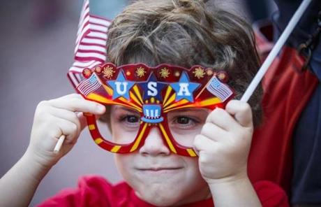SLIDER. Boston, MA - 7/4/2017 - Oliver Ziff, 5, adjusts his novelty glasses during Independence Day commemoration ceremony in Boston, MA, July 4, 2017. (Keith Bedford/Globe Staff)
