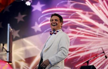 SLIDER. Boston, MA- July 04, 2017: Conductor Keith Lockhart jokes with the crowd during the Boston Pops Fireworks Spectacular in Boston, MA on July 4, 2017. (CRAIG F. WALKER/GLOBE STAFF) section: metro reporter:
