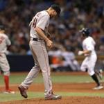 Boston Red Sox starter Chris Sale walks the mound as third baseman Deven Marrero, left, waits as Tampa Bay Rays' Peter Bourjos circles the bases after hitting a solo home run during the fifth inning of a baseball game Thursday, July 6, 2017, in St. Petersburg, Fla. (AP Photo/Steve Nesius)